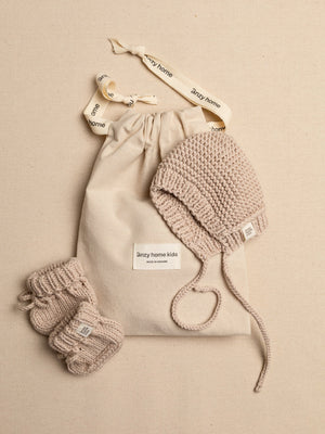 Sand hand-knitted baby bonnet and booties with drawstring gift pouch – Anzy Home